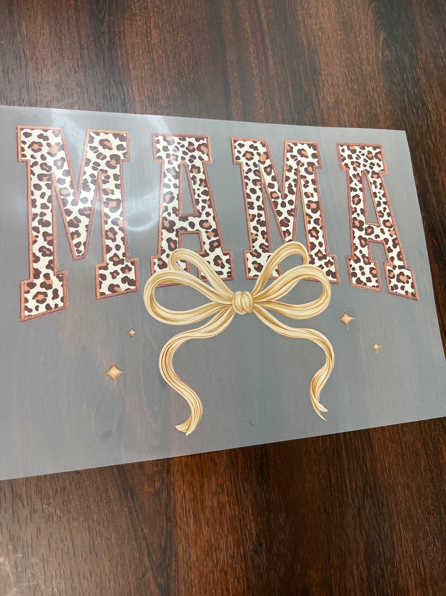 Cheetah mama with bow